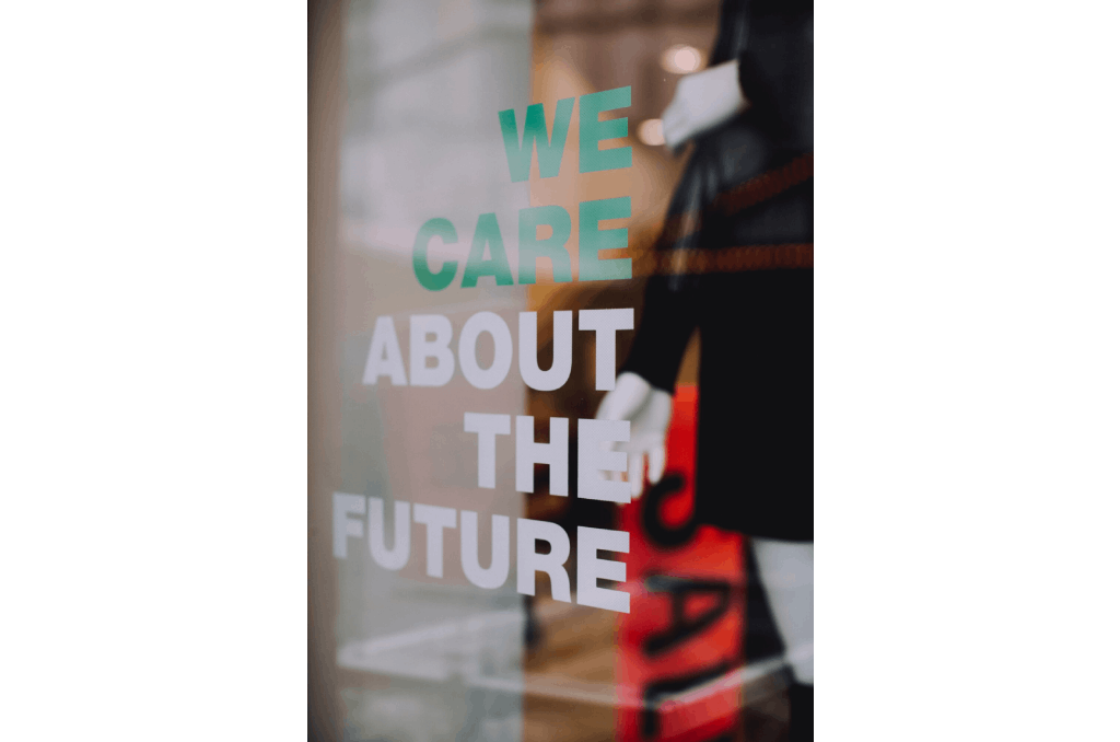 We Care About The Future Written on a Glass Window